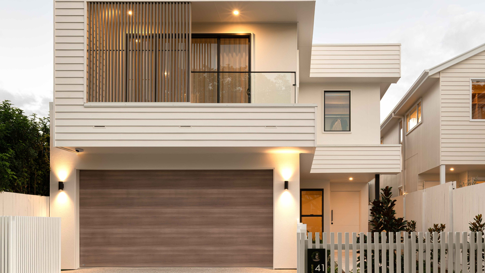 Technicians preparing advanced sectional doors for commercial projects in the 2000s